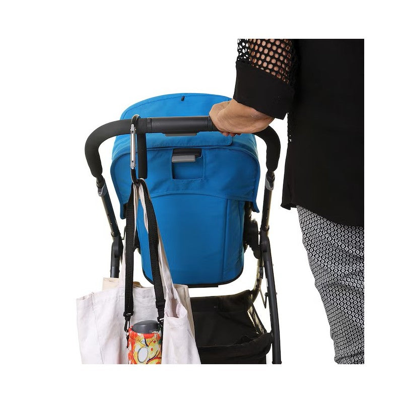 Dreambaby Stroller Hook securely holds bags on a stroller handle, with a blue stroller and bags visible in the image.