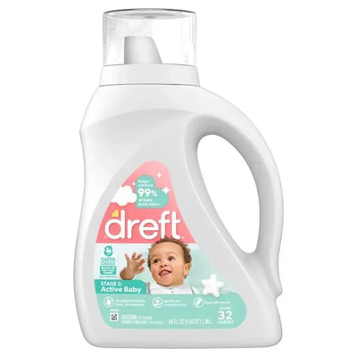 Dreft Newborn Baby Liquid Laundry Detergent bottle, 46 fl oz, labeled for 32 loads, with a smiling baby graphic and stain removal notes.