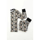Bamboo pajamas for babies featuring a playful animal print in soft hues, with a long-sleeve top and matching pants.