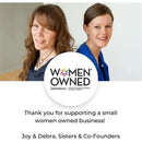 Women-owned business certification graphic featuring co-founders Joy and Debra, expressing gratitude for support.