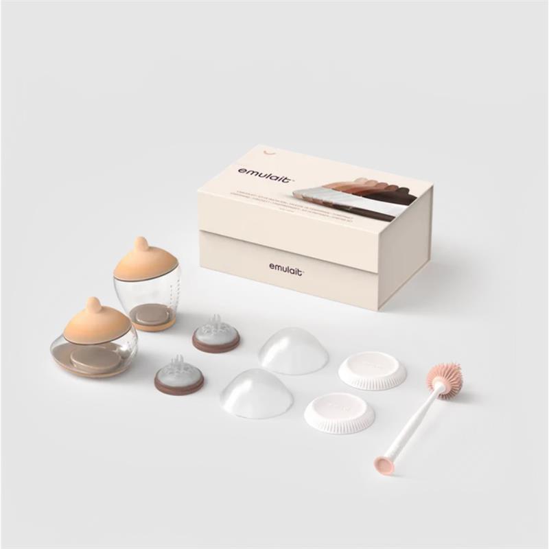 Starter kit from Emulait featuring two nipple bottles, various nipple shapes, and a cleaning brush in a packaged box.