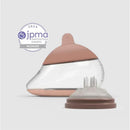 Anatomy bottle with fair-colored nipple shape 3, featuring a transparent body and a soft pink cap; 2024 JPMA Innovation Award winner.