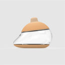 Anatomy Bottle featuring a tan silicone nipple and a clear rounded body, designed for feeding.