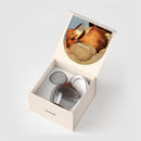 Emulait Classic Bottle with Deep Nipple Shape and color packaging, featuring a photo of a baby feeding.