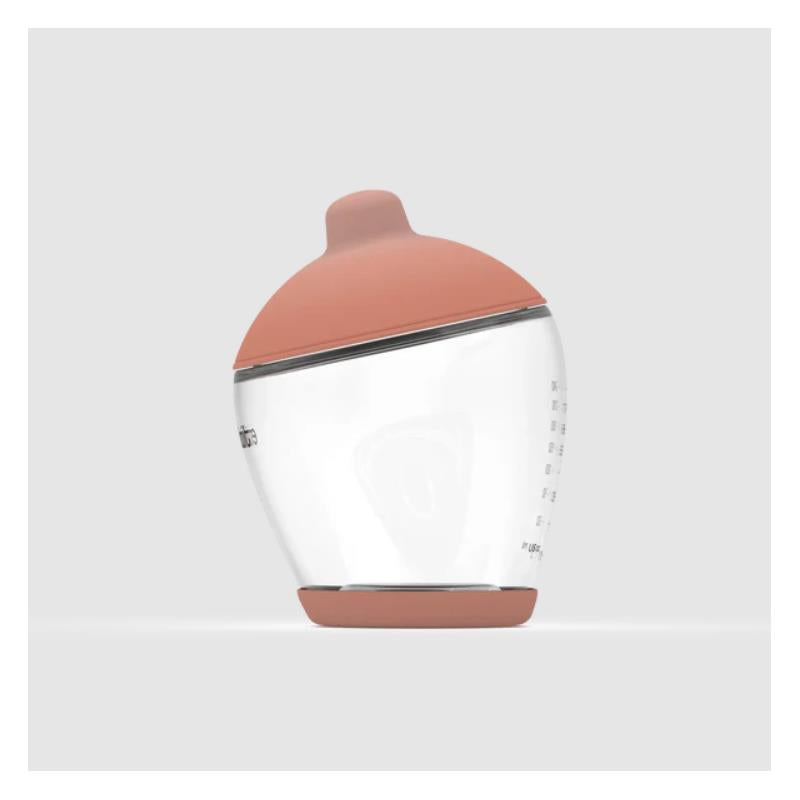 Medium-sized baby bottle with a soft pink nipple cap and clear body, labeled for measurements.