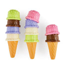 Colorful plastic ice cream cones stacked in a playful manner, featuring multiple pastel ice cream scoops on each cone.