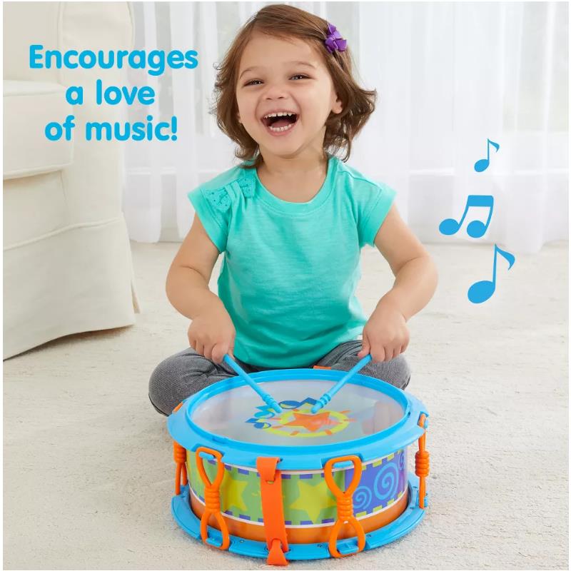 Child joyfully playing with the Epoch My First Drum Set, featuring a colorful design and two drumsticks.