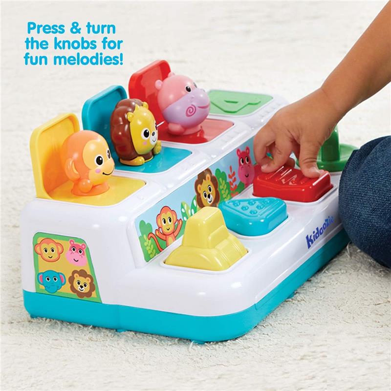 Colorful toy featuring animal figures and knobs, labeled with “Press & turn the knobs for fun melodies!”