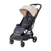 Lightweight Ergobaby Metro 3 stroller in natural beige and dark gray, features a canopy and safety harness.