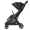 Ergobaby Metro 3 stroller in black, featuring a collapsible canopy, adjustable seat, and four wheels for mobility.