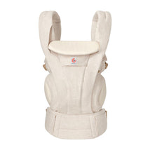 Ergobaby Omni Deluxe Baby Carrier in natural linen, designed for newborns to toddlers, featuring adjustable straps and a supportive seat.