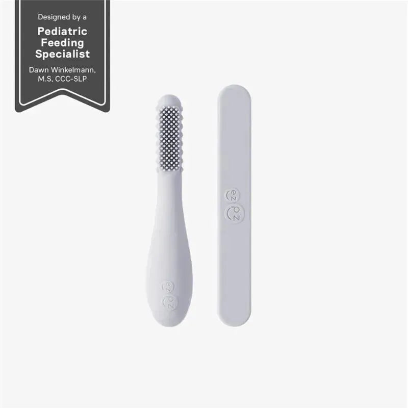 Ezpz Baby-Led Toothbrush and Sensory Tongue Depressor Dual Pack in pewter, featuring textured brushing surface and smooth depressor.