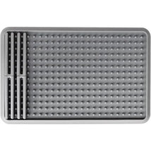 Gray Ezpz drying rack with a textured surface and three vertical slots for plates or cups.