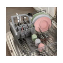 Ezpz Tiny Bowl in sage, along with various utensils and plates, arranged in a dishwasher.