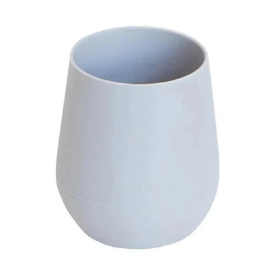 Pewter-colored silicone cup designed for toddlers, featuring a soft, spill-resistant shape.