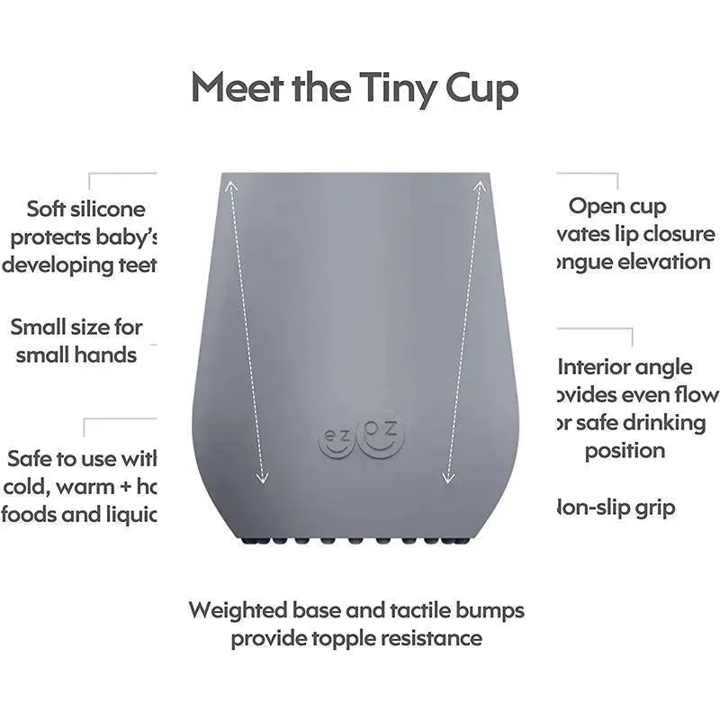 Pewter-colored Ezpz Tiny Cup designed for toddlers, featuring a weighted base, non-slip grip, and ergonomic shape for safe drinking.