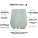 Tiny Cup in sage color designed for toddlers, made of soft silicone with a non-slip grip, promoting safe drinking.