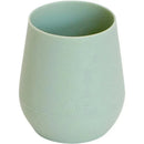 Sage-colored silicone cup designed for easy gripping, featuring a rounded shape and subtle branding on the base.