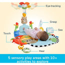 Fisher-Price 3-in-1 Kick & Sway Activity Gym features a baby lying on a colorful play mat with sensory toys.