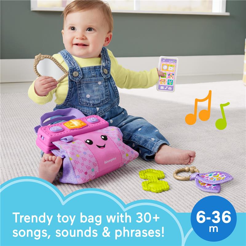 Toddler playing with the Fisher Price Laugh & Learn Purse, featuring a pink toy bag, interactive phone, and colorful accessories.
