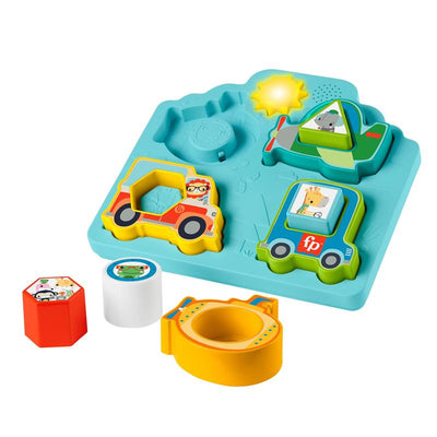 Fisher Price baby sorting toy featuring colorful vehicle shapes, sounds, and lights with puzzle board and five removable pieces.