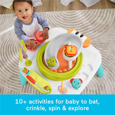 Fisher-Price Baby to Toddler 2-in-1 Purple Monkey Activity Center with a child interacting with colorful toys and activities.
