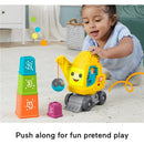Fisher Price Count & Stack Crane toy with colorful stacking blocks; a child plays with the smiling crane and its hanging ball.