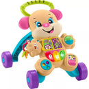 Fisher Price Laugh & Learn Smart Stages Sis Walker features a smiling dog on a wheeled frame with interactive buttons and educational lights.