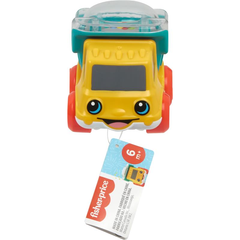 Yellow push-along dump truck toy with smiling face, red wheels, and clear top, suitable for children 6 months and older.