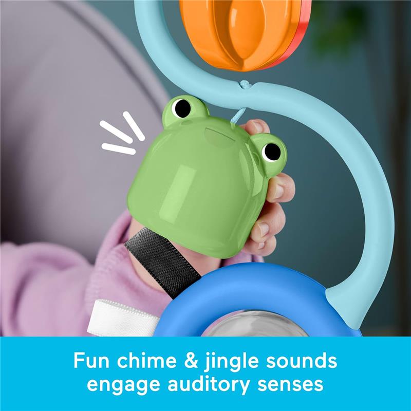 Fisher-Price Baby Toy featuring a green frog with chime sounds, engaging auditory senses.