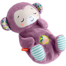 Purple monkey plush toy with a smiling face, patterned ears, and striped feet; designed as a portable sound machine for soothing babies.