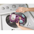 Fisher-Price Baby Toy Soothe ‘n Snuggle purple monkey plush being placed in a washing machine by a person.