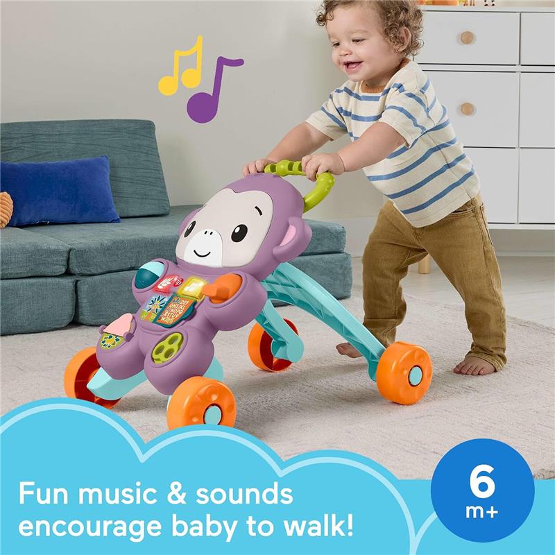 Fisher-Price Baby Walker Learn with Me Purple Monkey toy, encouraging walking with music and lights, used by a smiling toddler.