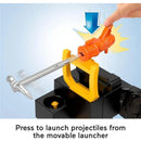 Press to launch projectiles from the movable orange launcher on the Fisher Price Imaginext Robo Command Center.