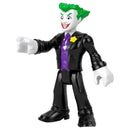Fisher Price Imaginext The Joker figure in a black suit with a purple vest and green hair, depicting a playful villain character.