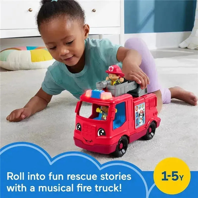 A young child plays with a red Fisher Price fire truck toy featuring smiling characters, promoting imaginative rescue stories.