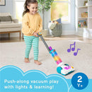 Young child using the Fisher-Price Laugh & Learn 2-in-1 Vacuum, engaging in playful cleaning with lights and sounds.