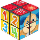 Fisher Price Laugh & Learn Puppy Activity Cube, featuring colorful numbers, letters, and a smiling puppy face.