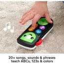 Fisher-Price Laugh & Learn Stream & Learn Remote with colorful buttons and a smiling face, used by a child’s hand, teaching songs and phrases.