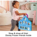 Toddler joyfully carries a blue carry case featuring Disney Frozen figures, promoting imaginative play and storage.