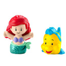 Ariel figurine with red hair and green tail beside a yellow fish character, both part of a Disney toddler toy.