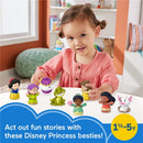 Toddler plays with Fisher Price Disney Princess toys, featuring characters like Snow White and Tiana, promoting imaginative storytelling.