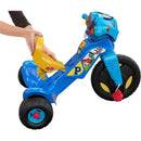 Fisher Price Paw Patrol tricycle with a blue frame, large wheels, and colorful character decals, featuring a removable yellow seat.