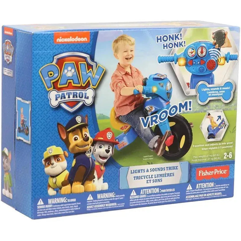 Fisher Price Paw Patrol Lights & Sounds Trike box featuring a child riding the tricycle with buttons for sounds and lights.
