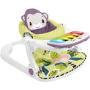 Portable Baby Chair with a monkey-themed seat, piano learning toy, and decorative floral play mat.