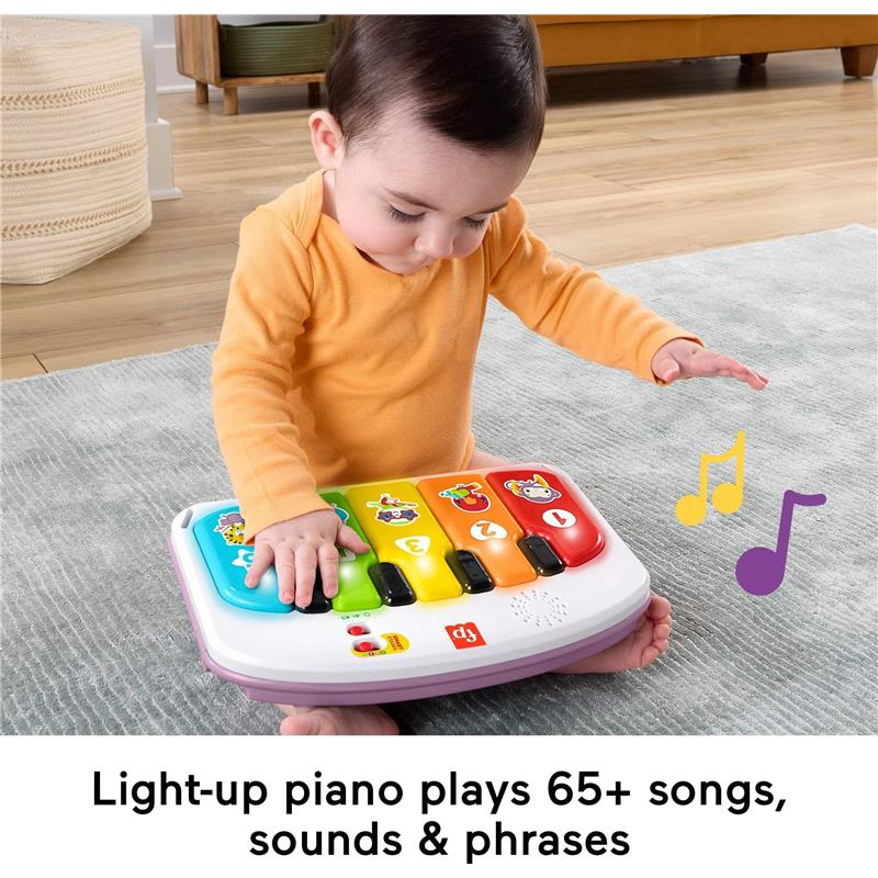 Portable baby chair with a light-up piano and colorful keys, encouraging music play for young children.