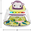 Portable baby chair with monkey design, piano learning toy, and floral-patterned tray for interactive play.