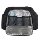 Quilted black diaper bag tote with adjustable strap, featuring three mesh pockets holding baby bottles inside.
