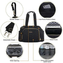 Quilted black diaper bag tote with adjustable straps, multiple pockets, stroller straps, and insulated bottle holder.