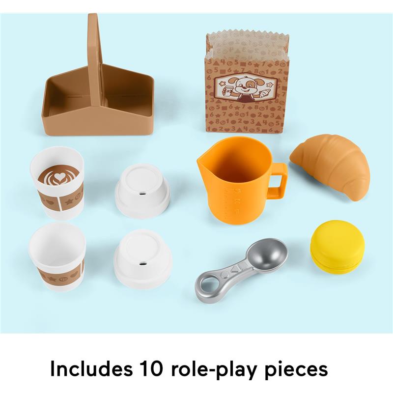 Fisher Price Laugh & Learn Coffee Café playset with 10 colorful role-play pieces including cups, a measuring spoon, and a croissant.